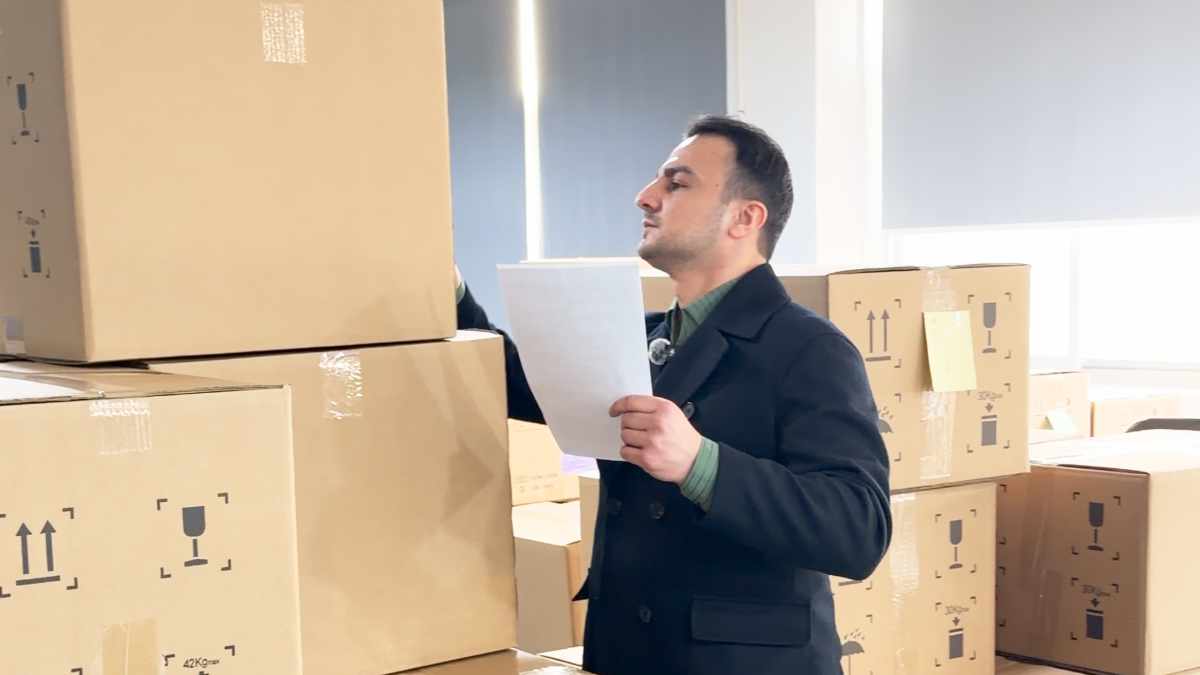 Auditor walking a China factory production line before an order is placed