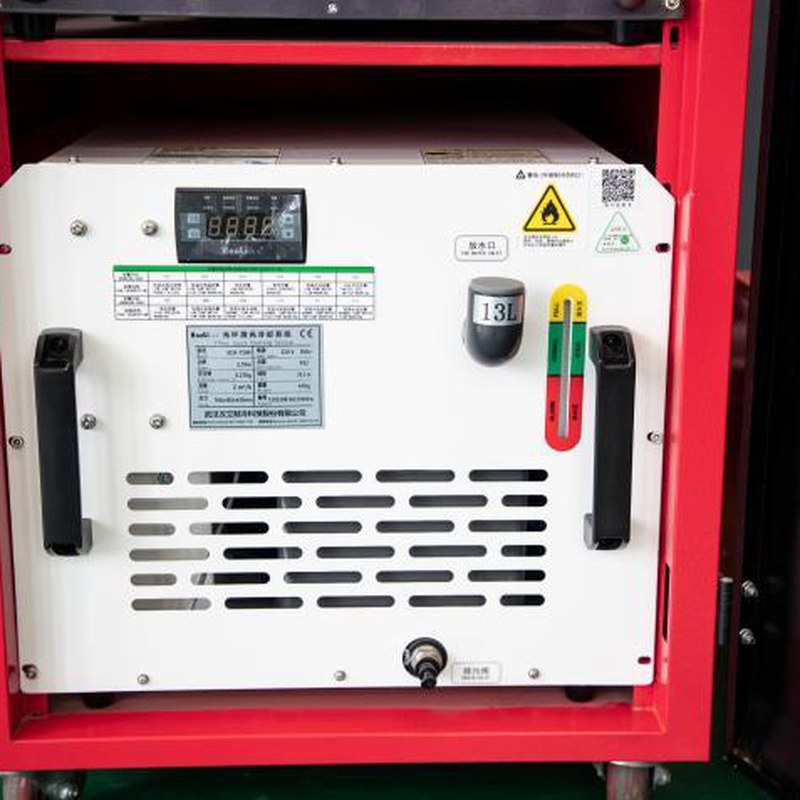 Water chiller panel inside a handheld laser welding cabinet